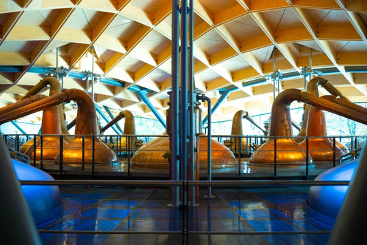 Copper kettle stills photo by Paul Byrne on Unsplash